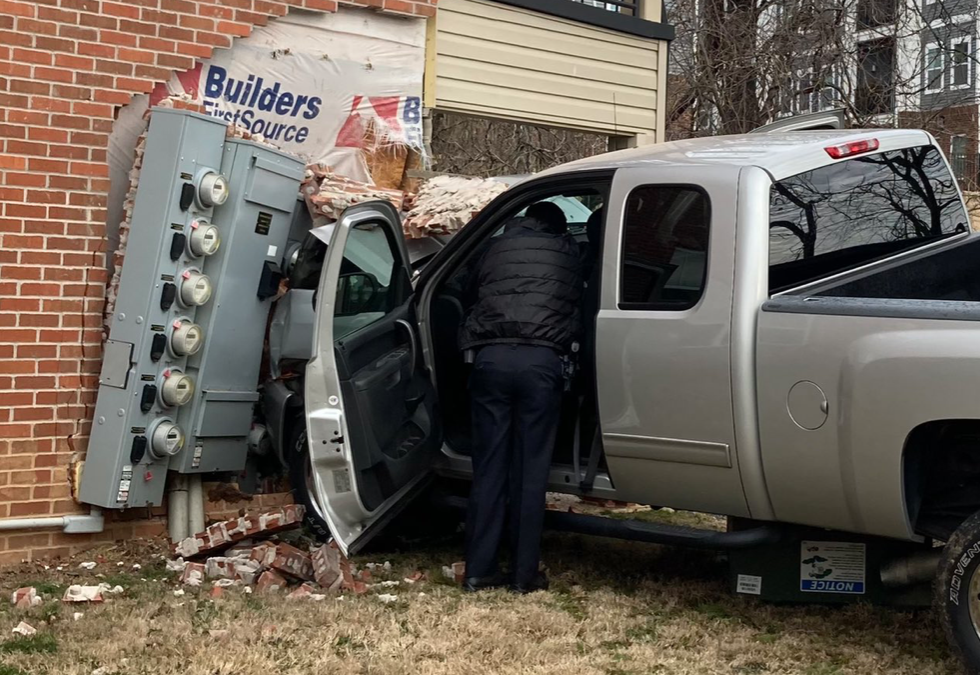 One person was rushed to the hospital and several customers were without power after a truck ran off the road and struck a building