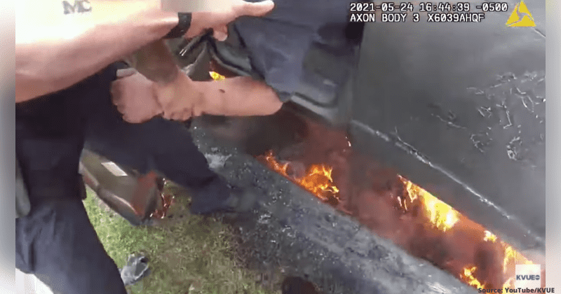 Two police officers dramatically save man from burning vehicle moments before it explodes into flames