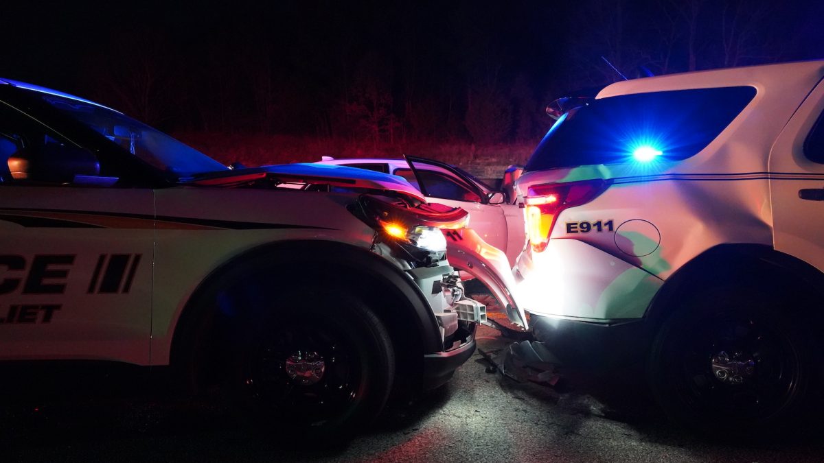 No serious injuries reported after two police cruisers were struck on Interstate 40 Thursday night