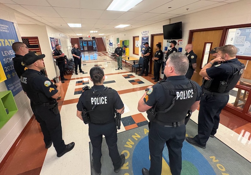 Chattanooga police officers connect with students during morning lineup at Brown Academy